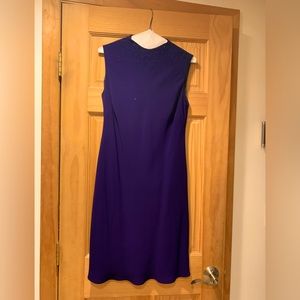 Purple cocktail dress with sparkle stones at the top